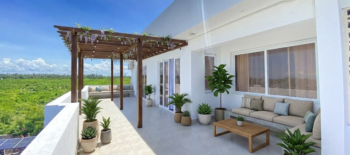 The rooftop terrace at Siriba Resort Watamu, with a pergola and seating overlooking the treetops