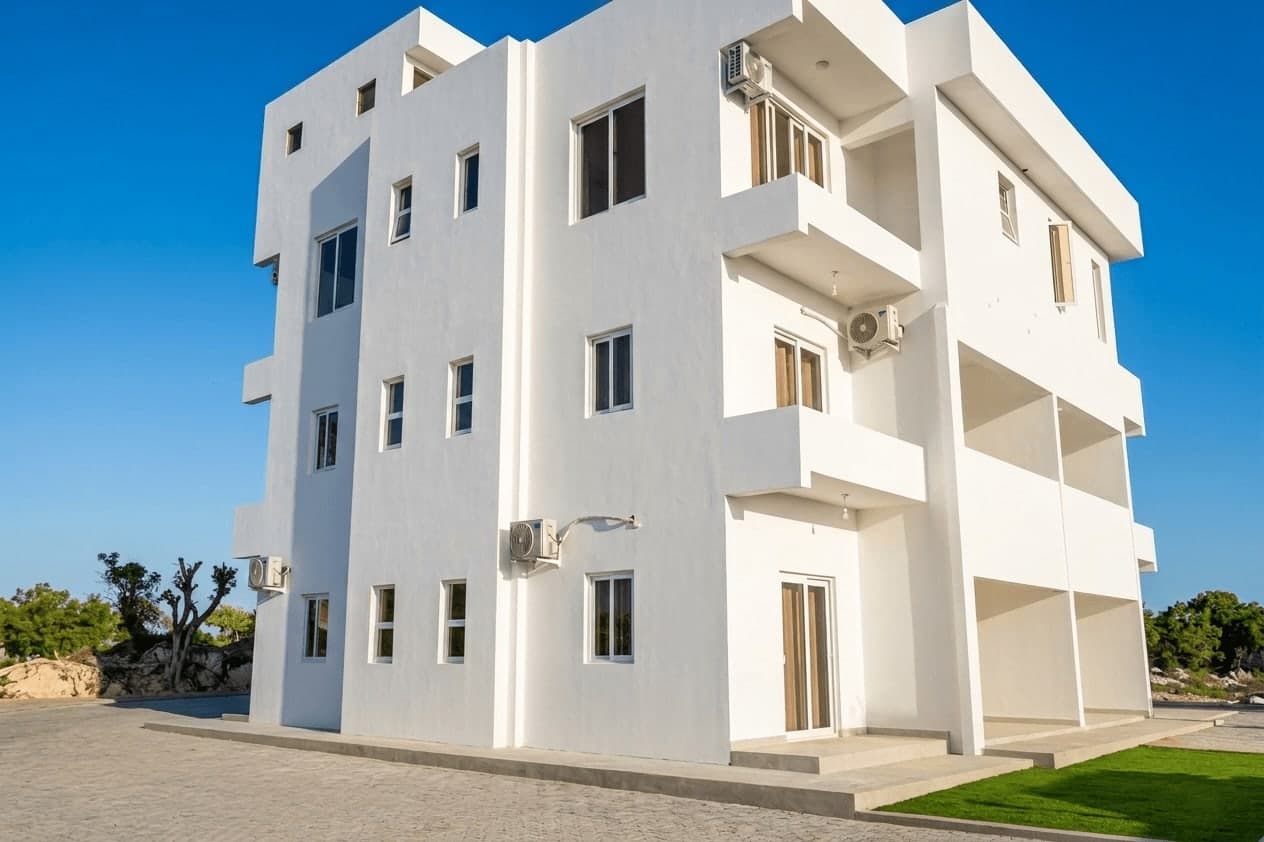 The apartment building at Siriba Resort Watamu, with balconies overlooking the garden